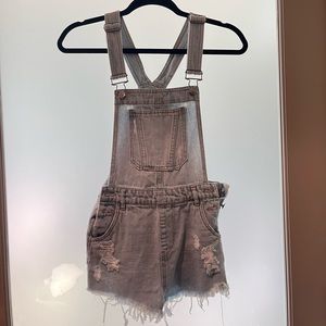 Light distressed denim overalls